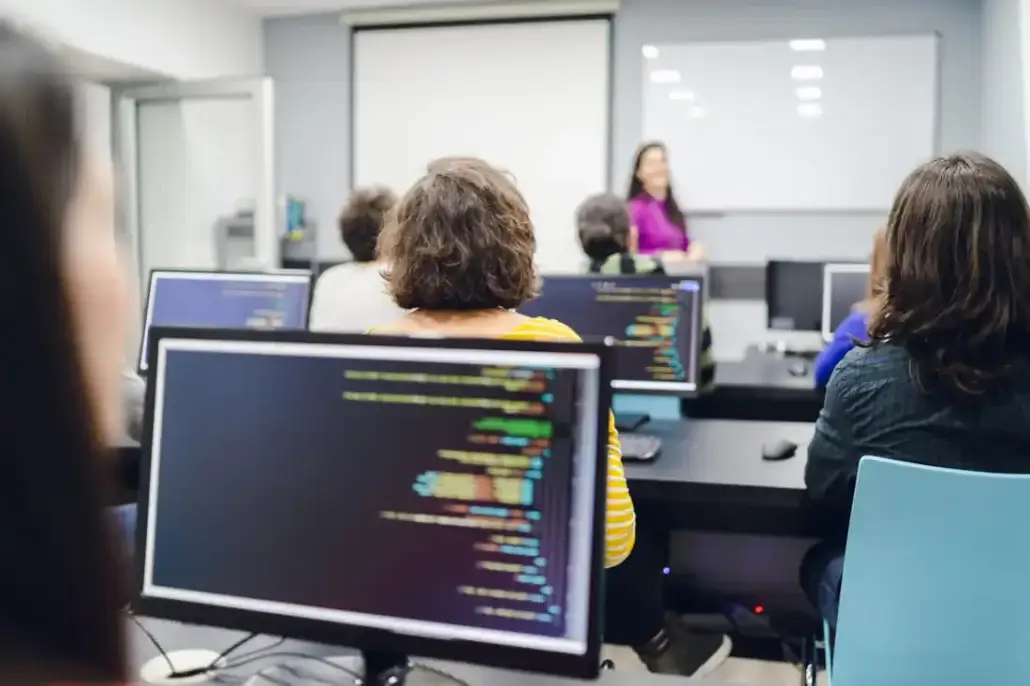 students learning to code in a classroom